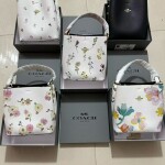 Coach Small White Leather Bucket Bag With Floral Print